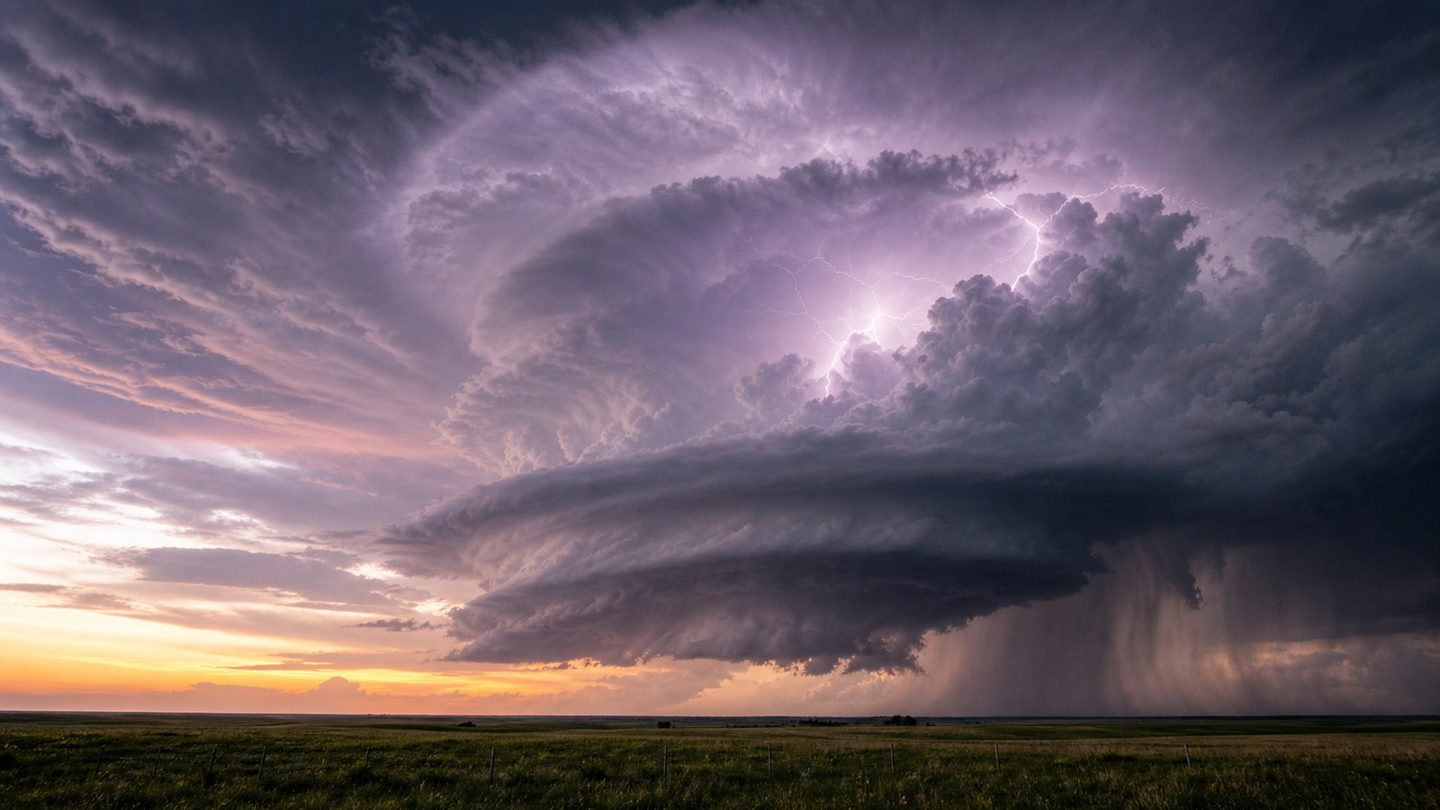 Immense supercell thunderstorm over open plains with lightning glow and distant rain core.